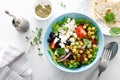 Mediterranean Greek and chickpea salad with fresh vegetables and feta cheese Royalty Free Stock Photo