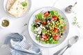 Mediterranean Greek and chickpea salad with fresh vegetables and feta cheese Royalty Free Stock Photo