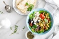 Mediterranean Greek and chickpea salad with fresh vegetables and feta cheese Royalty Free Stock Photo