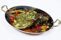 mediterranean grilled sea bass fish with tomato, caper, artichoke, olive sauce