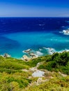 Mediterranean hidden places at Kastro, Skiathos island, Greece. Beautiful vivid panorama view of blue aegean sea coast from wild Royalty Free Stock Photo