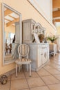 Mediterranean interior - mirror and chair Royalty Free Stock Photo