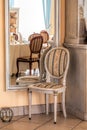 Mediterranean interior - mirror and chair