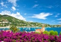 Mediterranean landscape sea sky rhododendron flowers French reviera Royalty Free Stock Photo