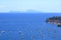 Mediterranean landscape. Sea view of the Gulf of Naples and the silhouette of the island of Capri in the distance. The province of Royalty Free Stock Photo