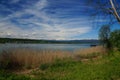 Mediterranean landscape with white mountains towering over the lake Royalty Free Stock Photo