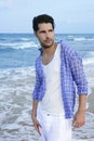 Mediterranean latin young man on beach