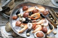 Mediterranean, raw seafood mix on a metal plate. Marine composition, selective focus. Fish shop assortment.