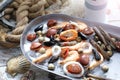 Mediterranean, raw seafood mix on a metal plate, top view. Marine composition, selective focus. Fish shop assortment.