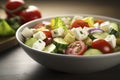 A tangy and refreshing Mediterranean salad, with juicy tomatoes, crisp cucumber, feta cheese, and a lemony dressing.Â 