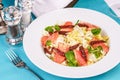 Mediterranean salad. Cabbage, tomatoes, smoked seeds, olives, olives, basil and rosemary, seasoned with olive oil and balsamic sau Royalty Free Stock Photo