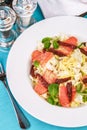 Mediterranean salad. Cabbage, tomatoes, smoked seeds, olives, olives, basil and rosemary, seasoned with olive oil and balsamic sau Royalty Free Stock Photo