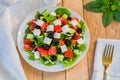 Mediterranean salad with feta cheese, tomatoes, cucumbers and olives Royalty Free Stock Photo