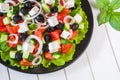 Mediterranean salad with feta cheese, tomatoes, cucumbers and olives Royalty Free Stock Photo