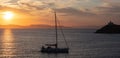 Mediterranean sea. Beautiful sunset and a lighthouse at Kea island, Greece Royalty Free Stock Photo