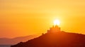 Mediterranean sea. Beautiful sunset and a lighthouse at Kea island, Greece. Royalty Free Stock Photo