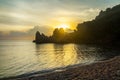 Mediterranean Sea, Cirali Beach. Dawn.The sun rises from the rocks. Royalty Free Stock Photo
