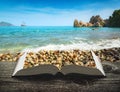 Mediterranean sea coast on a book