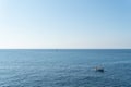 The Mediterranean Sea with a fishing boat Royalty Free Stock Photo
