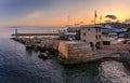 Mediterranean Sea with the lighthouse at sunset in the harbor, Nice, France Royalty Free Stock Photo