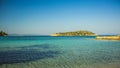 Mediterranean sea picturesque peaceful lagoon summer time landscape shallow water foreground and island horizon background scenic