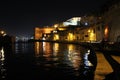 mediterranean sea, quay and old stone houses in valletta (malta)