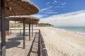 Mediterranean sea, spring sunny day, beach and umbrella terrace