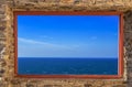 Mediterranean Sea view through old stone window, Spain Royalty Free Stock Photo