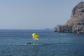 Mediterranean seascape with parachute with a smiley face