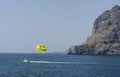 Mediterranean seascape with parachute with a smiley face