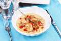 Mediterranean soup with seafood, crab meat, fish and chicken with creamy broth