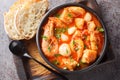 Mediterranean soup of seafood and white fish with shrimp, mussels, scallops, squid close-up in a bowl. horizontal top view Royalty Free Stock Photo