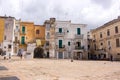 Mediterranean square with ancient buildings with television antennas. Italian traditional architecture. Bari town landmark.