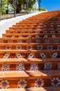 Mediterranean style ceramic tiles lining an upward spiral staircase Royalty Free Stock Photo