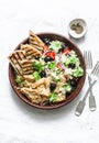 Mediterranean style lunch - couscous, cherry tomatoes, cucumbers, feta cheese, olives salad and lemon herbs roasted chicken breast Royalty Free Stock Photo