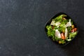 Mediterranean-style salad with lettuce corn, goat cheese, olives Royalty Free Stock Photo