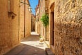 Mediterranean summer cityscape - view of a medieval street in the Old Town of Hvar, on the island of Hvar Royalty Free Stock Photo