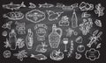 Mediterranean traditional food collection on a chalkboard background