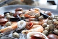 Mediterranean, raw seafood mix on a metal plate, close-up. Marine composition, selective focus. Fish shop assortment.