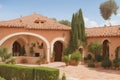 A Mediterranean villa with a terracotta roof and a cobblestone courtyard generated Ai