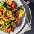 Warm salad of shrimp, broccoli and paprika