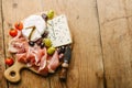 Mediterranian appetizers on old wooden table Royalty Free Stock Photo