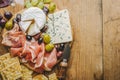 Mediterranian appetizers on old wooden table Royalty Free Stock Photo