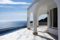 mediterrnean house exterior, with view of the sea or pool in the background Royalty Free Stock Photo