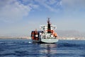 Medium containership Renate P sailing after leave Alicante harbor. Royalty Free Stock Photo