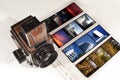 Medium format photo camera and diapositives. Royalty Free Stock Photo