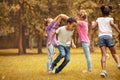 Medium group of children playing at public park.