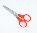 Medium iron scissors Orange plastic handle Royalty Free Stock Photo