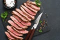 Medium meat. Grilled steak with provencal herbs on a stone board Royalty Free Stock Photo