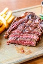 medium rare beef steak with vegetable and french fries Royalty Free Stock Photo